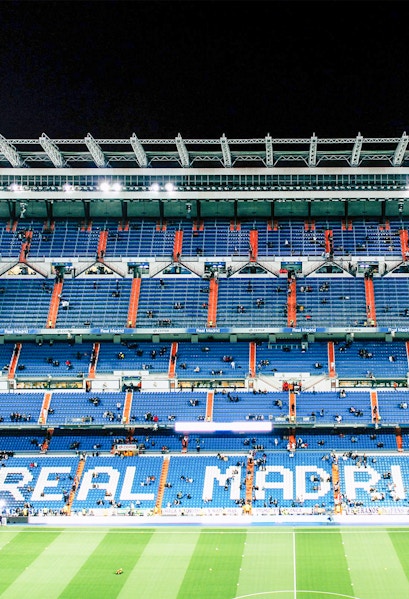Bernabeu Stadium seating area in Madrid, showcasing "Real Madrid" signage.