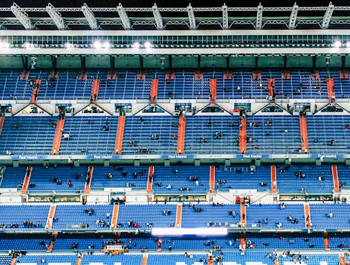 Bernabeu Stadium seating area in Madrid, showcasing "Real Madrid" signage.