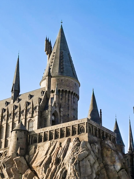 Harry Potter Castle at Universal Studios Orlando with spires and stone facade.