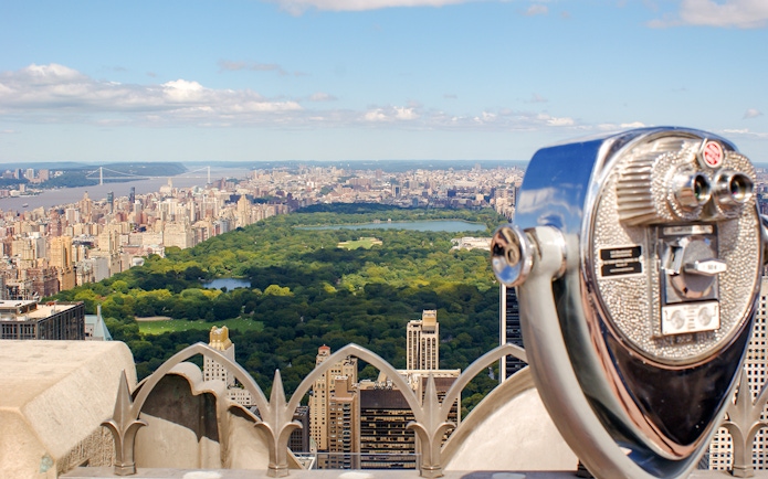 Skyline view of Manhattan and Central Park from a New York City observation deck.