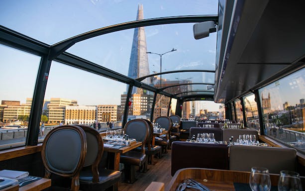 Bustronome dining experience with view of The Shard in London.