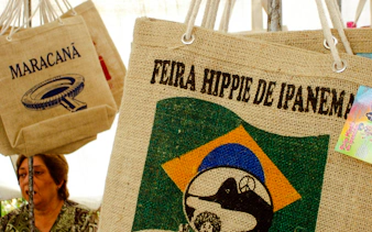Bags displayed at Ipanema Street Market, Rio de Janeiro, featuring local designs.