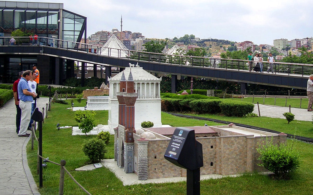 Guests viewing miniature landmarks at Istanbul Miniatürk park.