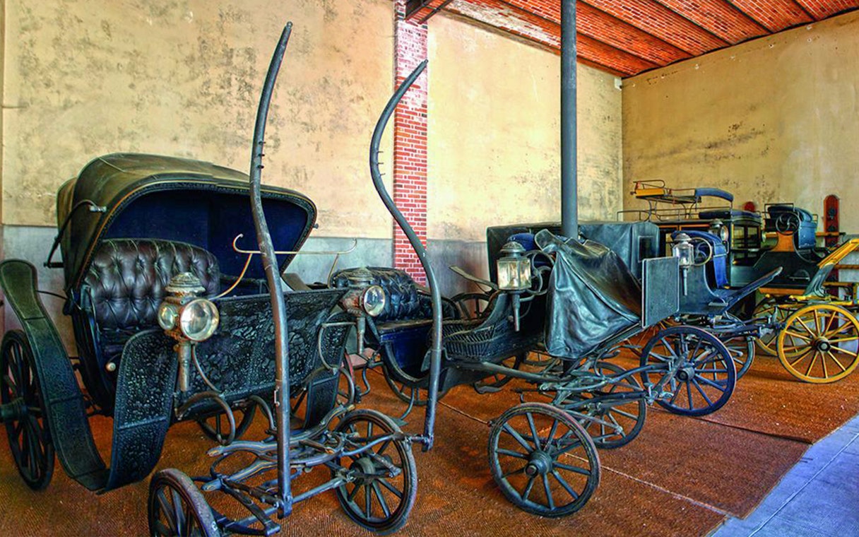 Antique carriages at Domaine du Chaumont-sur-Loire Castle entrance, Loire Valley, France.