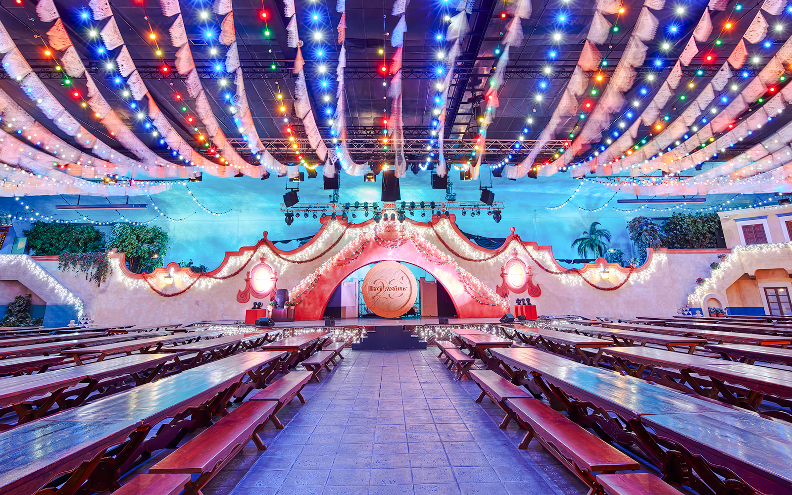 Colorful lights and festive decor at PortAventura Park's nighttime event venue.