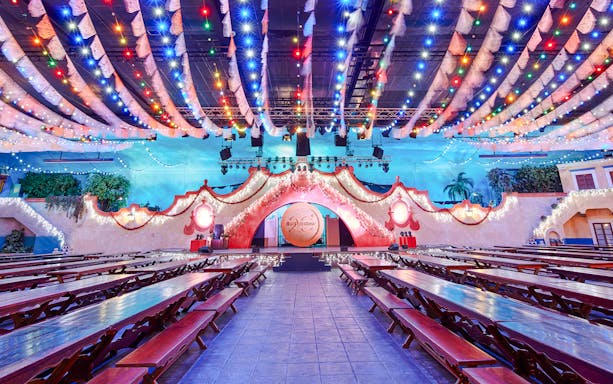 Colorful lights and festive decor at PortAventura Park's nighttime event venue.