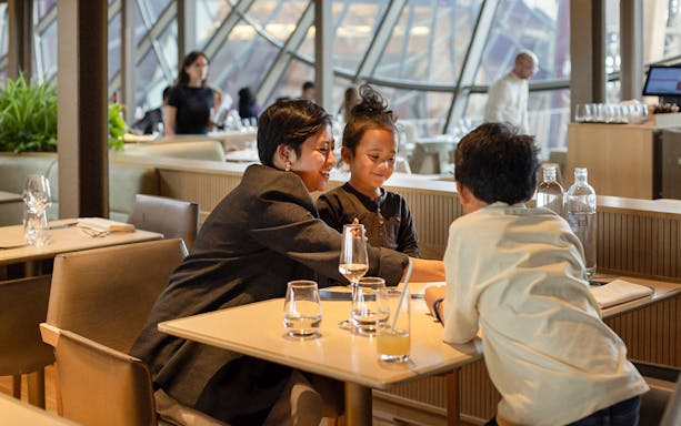 Lunch at Madame Brasserie, Eiffel Tower, Paris with family dining together.