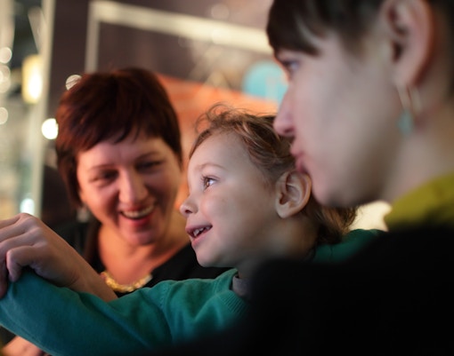 Family looking at Archaeological Artifacts