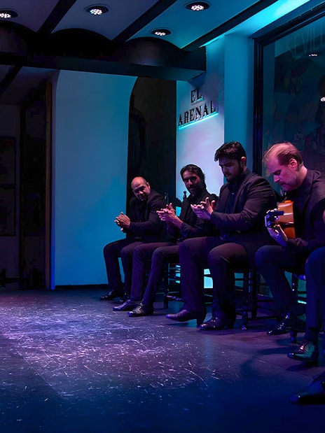 Musicians performing at Tablao El Arenal Flamenco show in Seville.