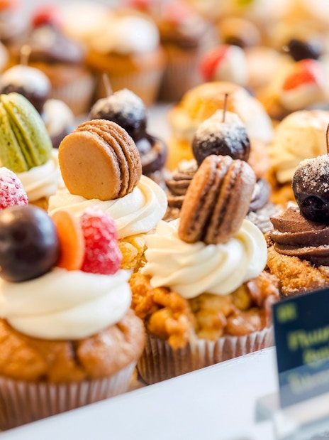 Pastries with macarons and fruit toppings at the Markthal in Rotterdam.