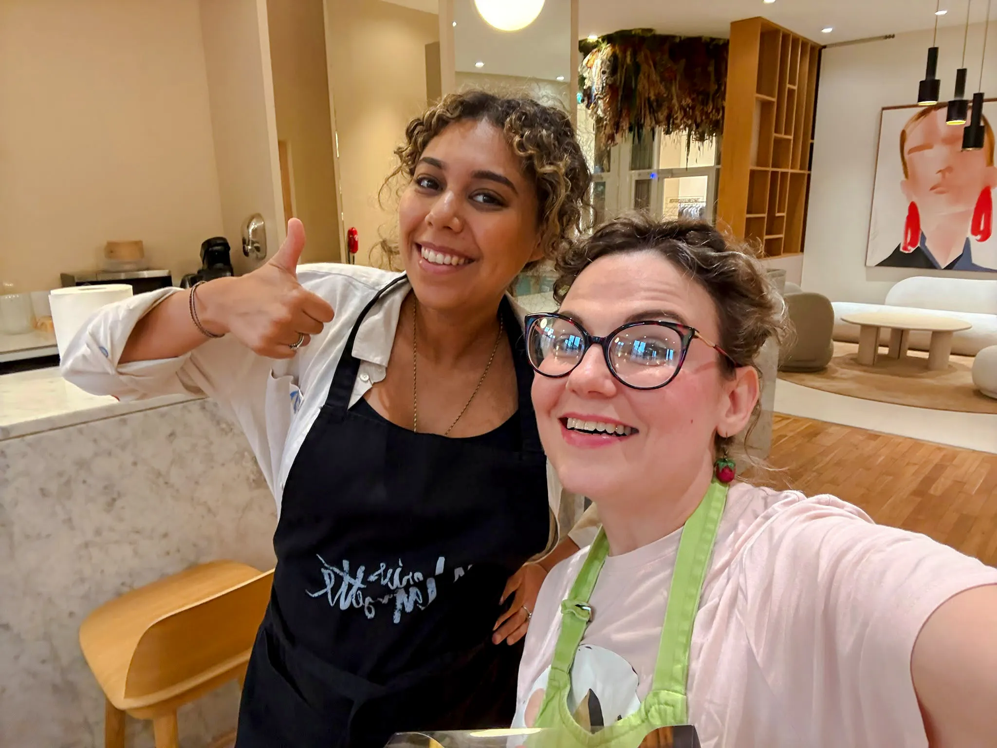 Participants enjoying a macaron class in Paris.