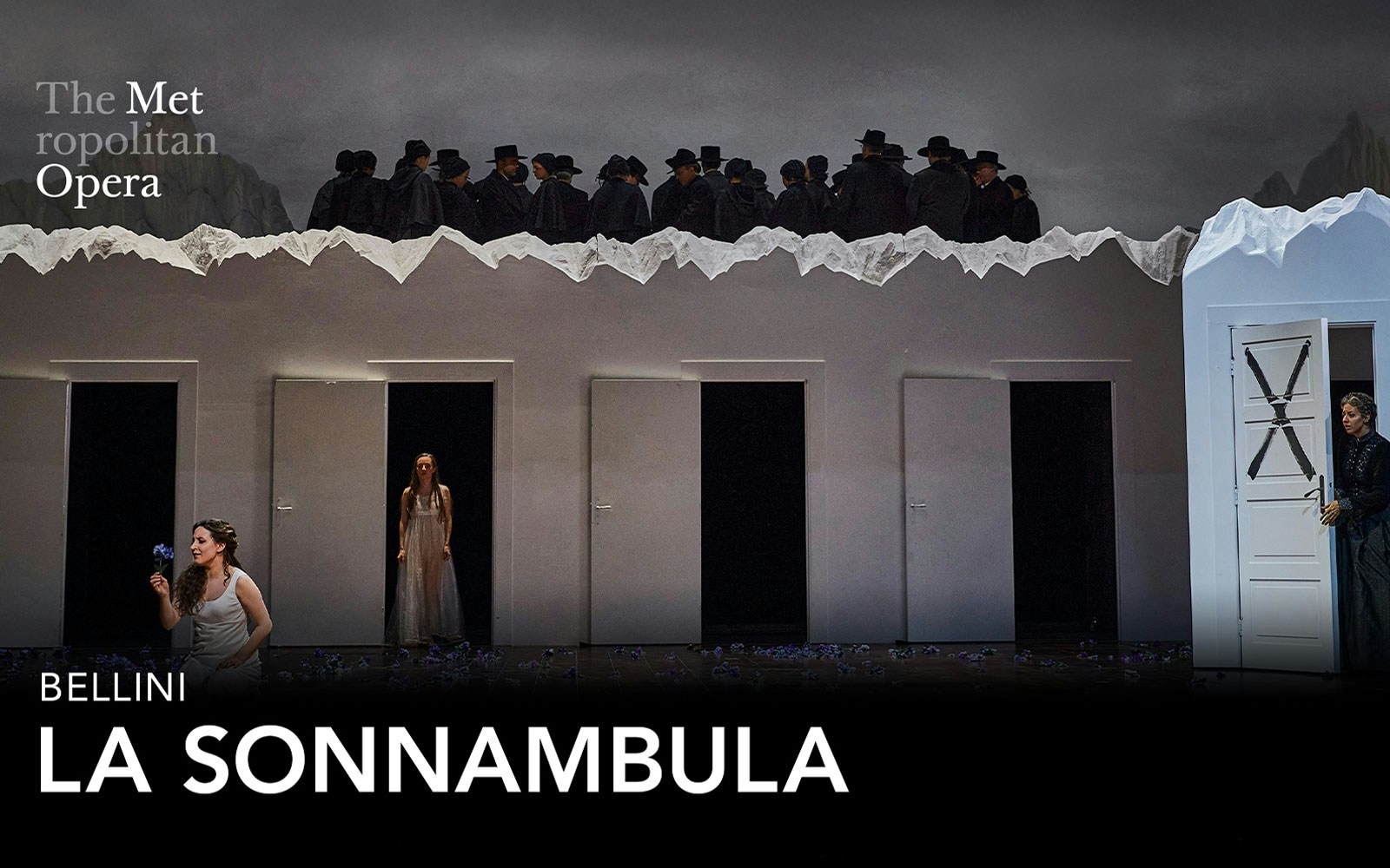 La Sonnambula opera scene at the Metropolitan Opera with performers on stage.