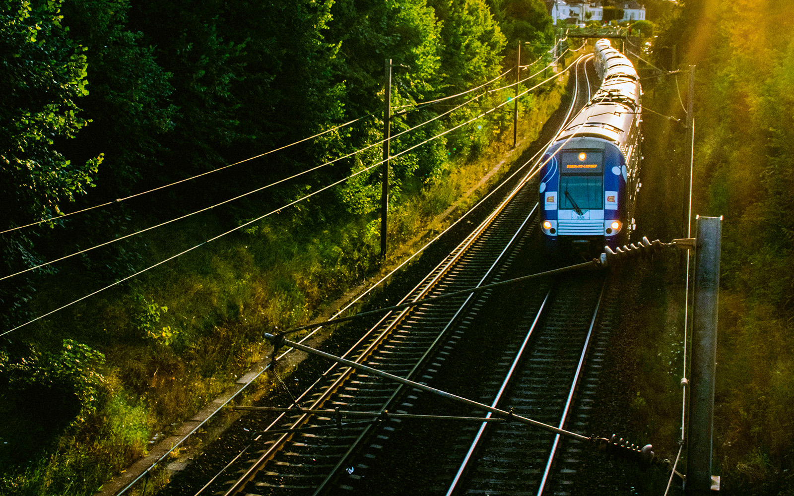 Train journey from Paris to Giverny passing through scenic French countryside.