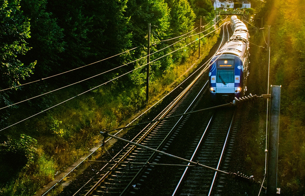 Train journey from Paris to Giverny passing through scenic French countryside.