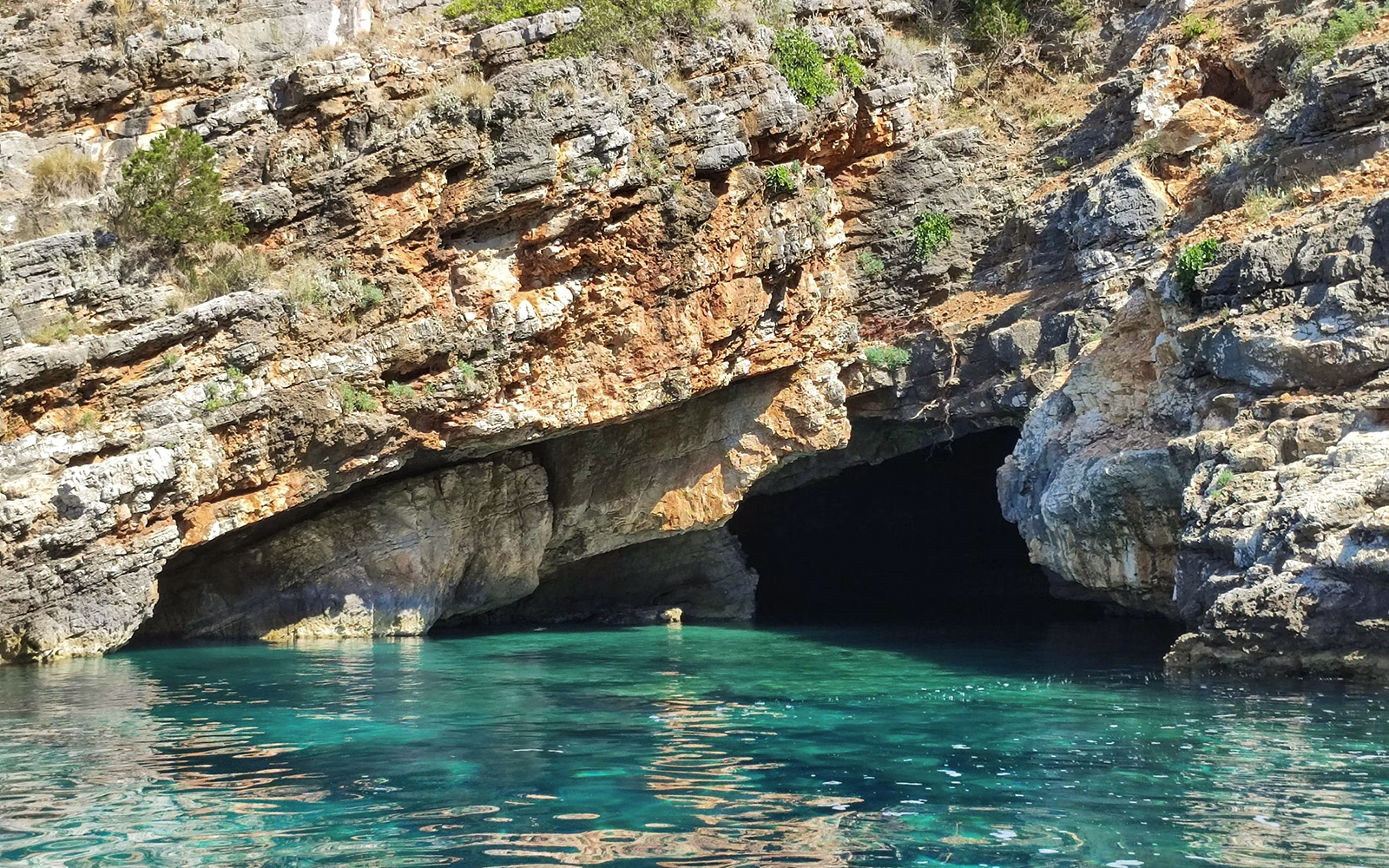 Sea cave entrance at Karaburun-Sazan National Marine Park, Albania.