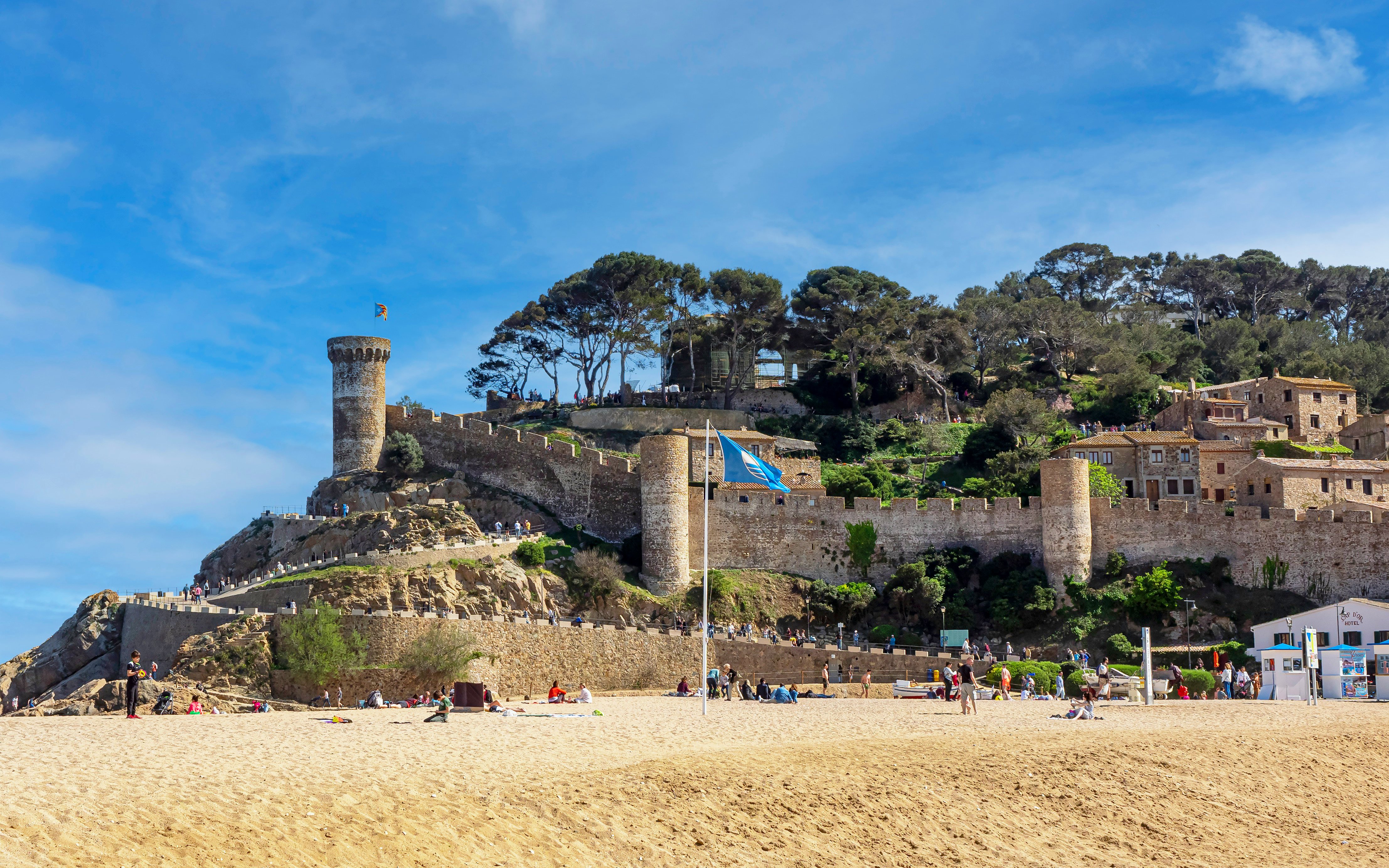 Tossa de Mar Castle and Vila Vella on Costa Brava, Spain, viewed from the beach.