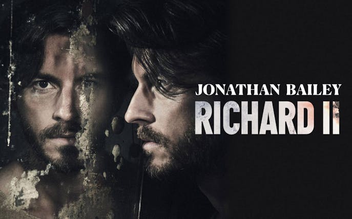 Actor in Richard II promotional poster with reflective surface.
