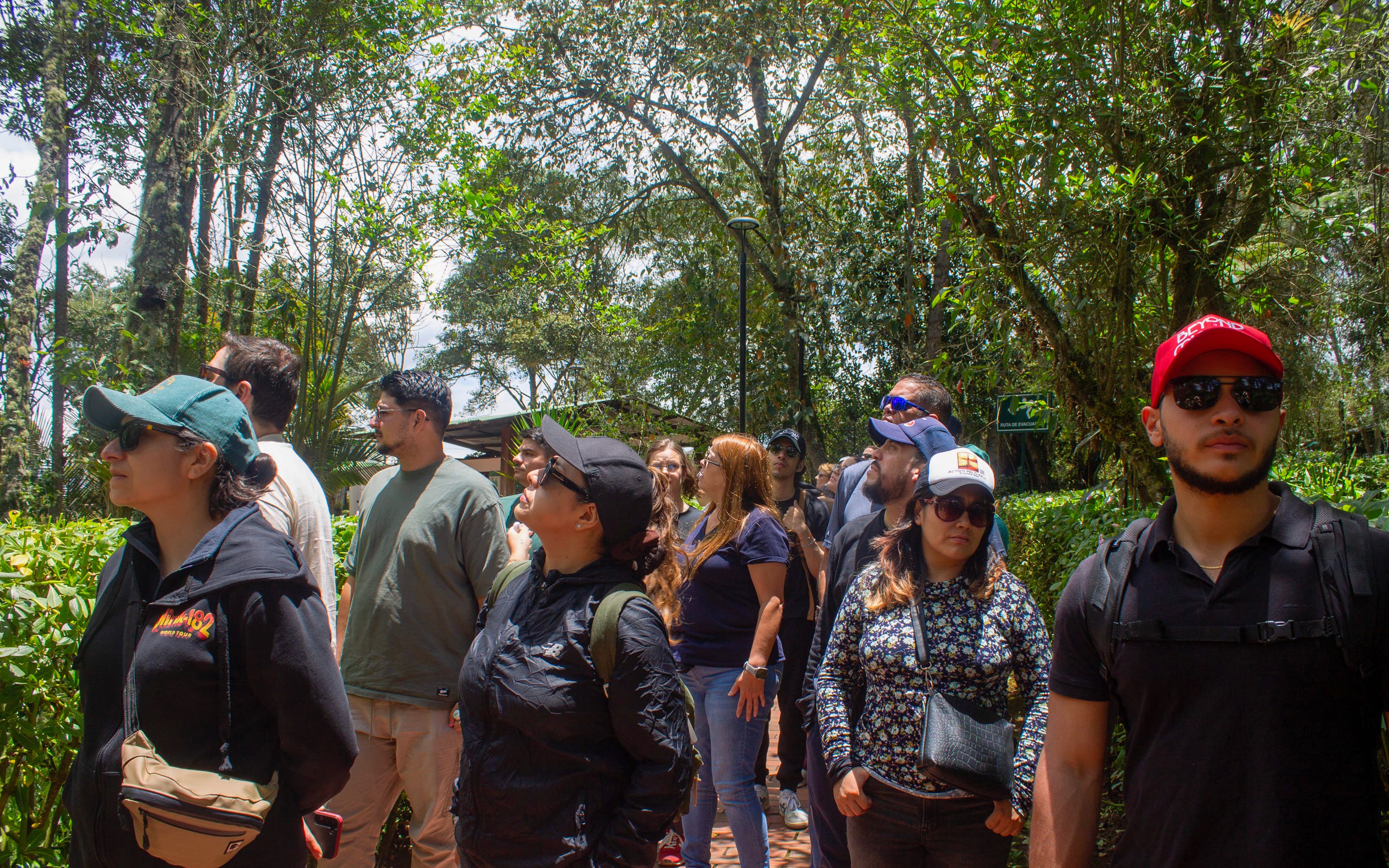 Tourists with guide exploring Zipaquira Salt Cathedral and Guatavita Lake area.