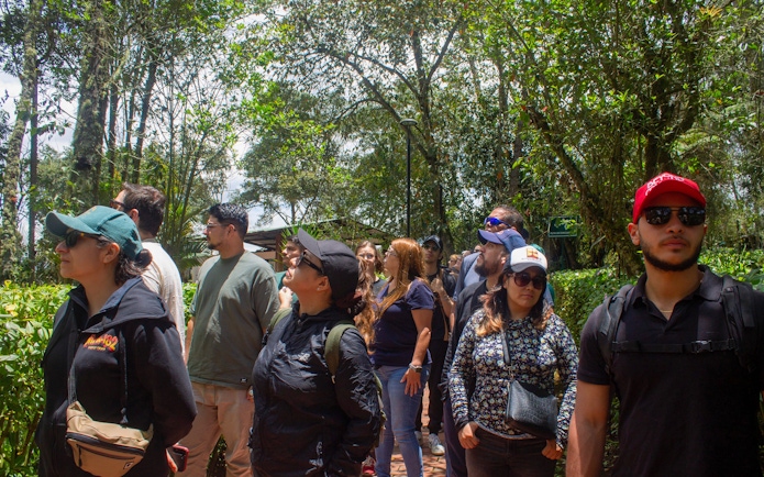Tourists with guide exploring Zipaquira Salt Cathedral and Guatavita Lake area.