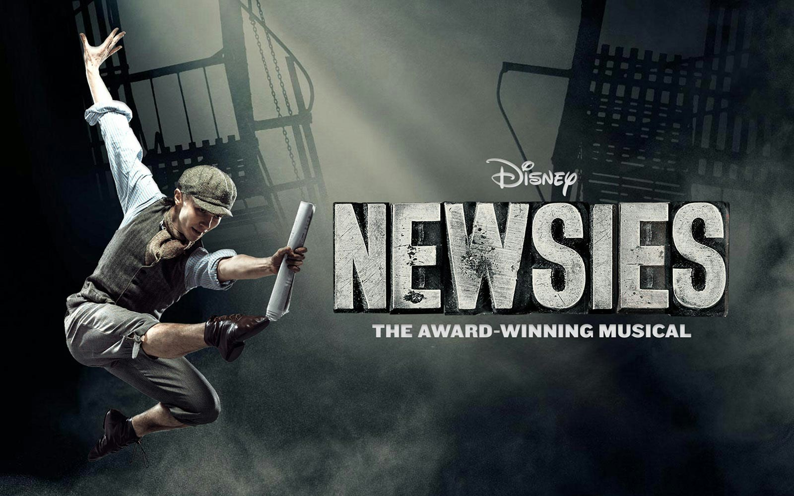 Performer leaping with newspaper in Disney's Newsies musical poster.
