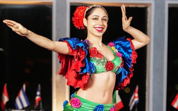 Dancer performing in colorful costume during Bosphorus dinner cruise show.
