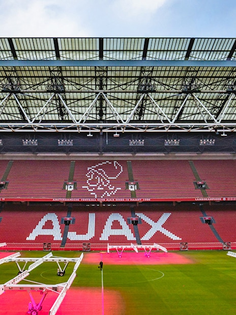 Johan Cruijff Arena interior with Ajax logo on seats, Amsterdam.