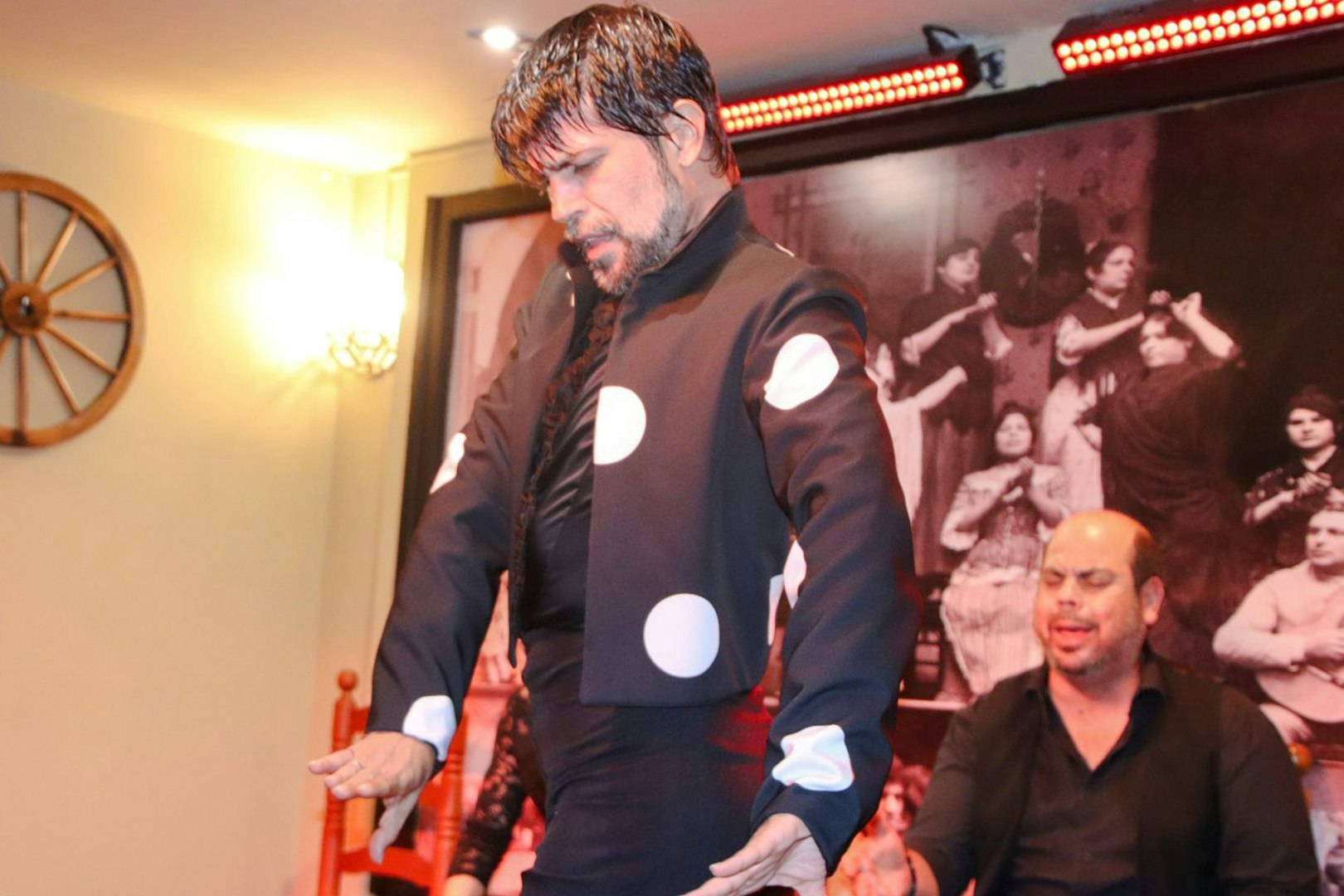 Flamenco dancer performing at Tablao La Cantaora show in Seville.