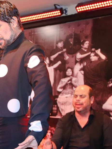 Flamenco dancer performing at Tablao La Cantaora show in Seville.