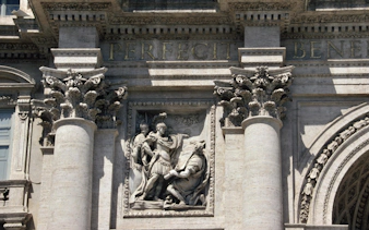 Sculptural detail of Trevi Fountain in Rome, Italy, featuring Roman figures.