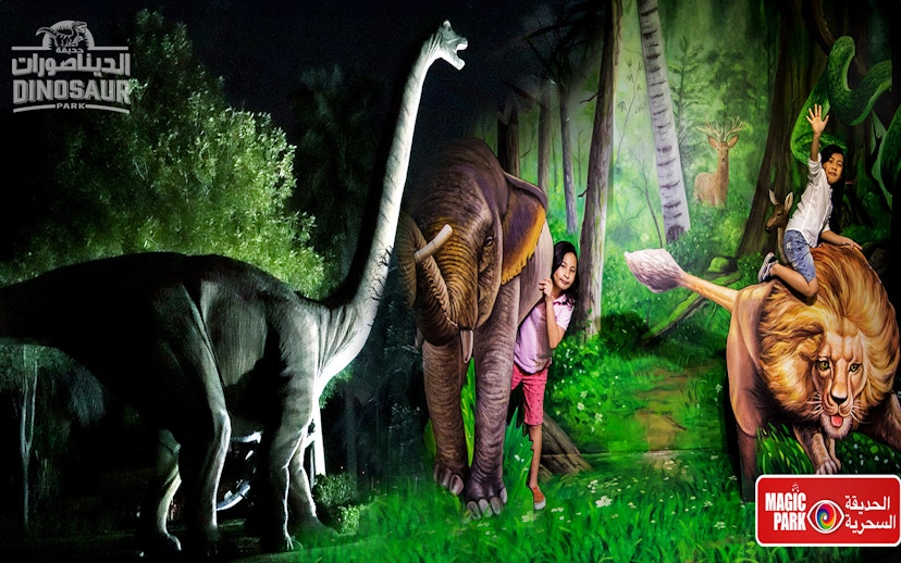 Children interacting with dinosaur and animal sculptures at Dubai Garden Glow.