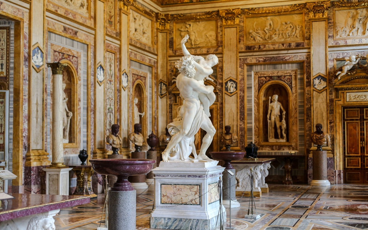 Sculpture in ornate room at Borghese Gallery, Rome.