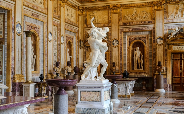 Sculpture in ornate room at Borghese Gallery, Rome.