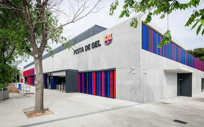 FC Barcelona Ice Rink entrance with colorful facade and club emblem.