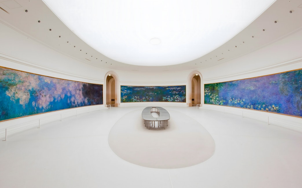 Panoramic view of Monet's Water Lilies in Orangerie Museum, Paris.