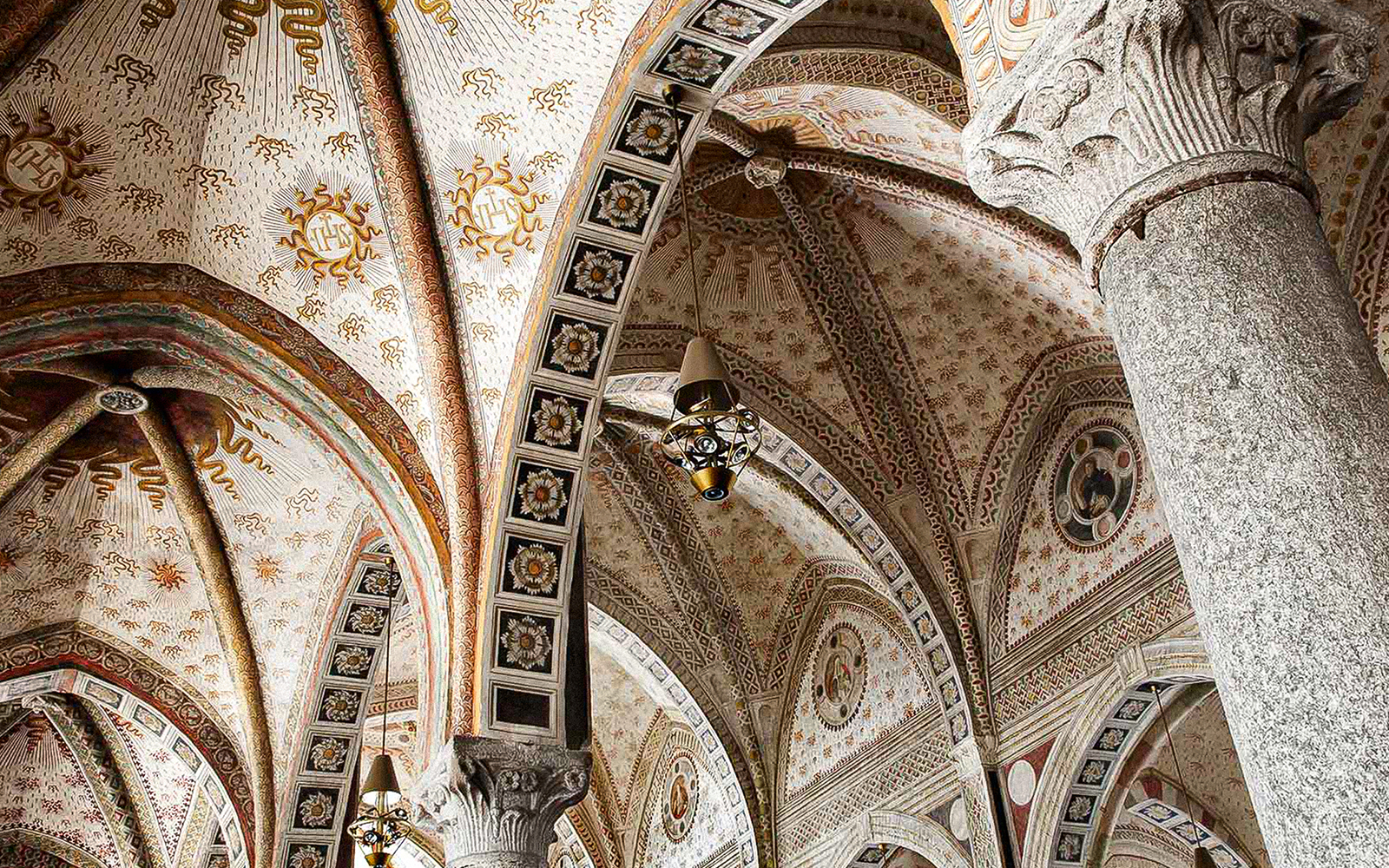 Intricate ceiling and column details in Santa Maria delle Grazie, Milan.