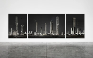 Triptych artwork of rocket launch site at ArtScience Museum, Singapore.