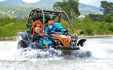 Buggy crossing a stream during Alanya Buggy Safari tour in Turkey.
