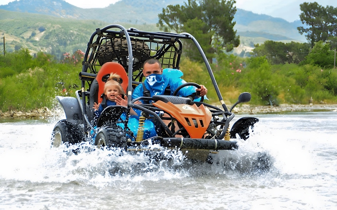 Buggy crossing a stream during Alanya Buggy Safari tour in Turkey.