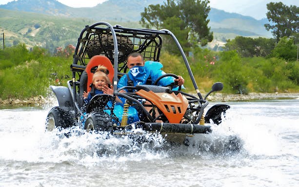Buggy crossing a stream during Alanya Buggy Safari tour in Turkey.