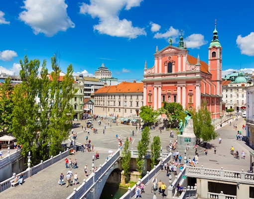 Preseren Square in Ljubljana with the Franciscan Church and Triple Bridge.