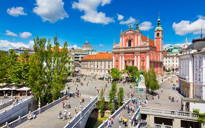 Preseren Square in Ljubljana with the Franciscan Church and Triple Bridge.