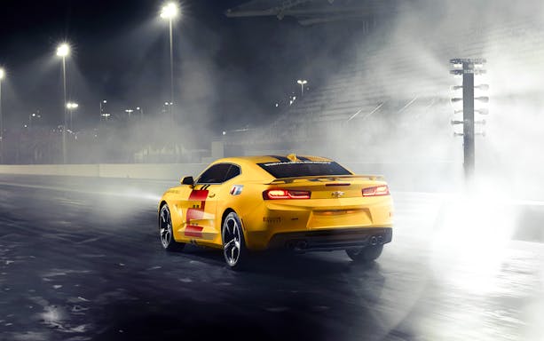 Chevrolet Camaro SS on drag strip at Yas Marina Circuit, night driving experience.