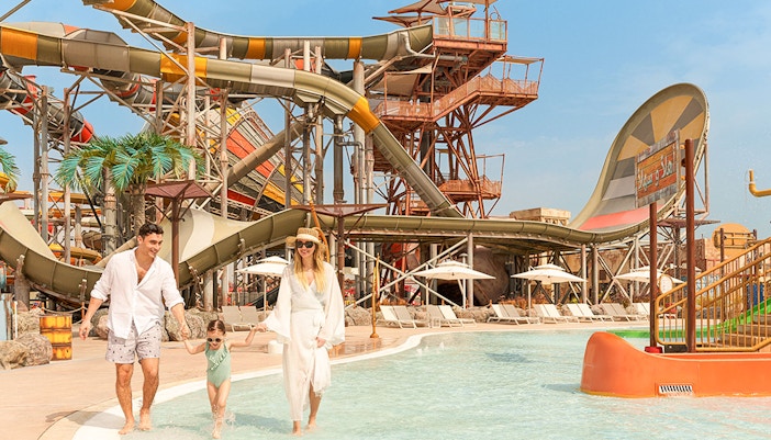 Family exploring rides at Meryal Waterpark