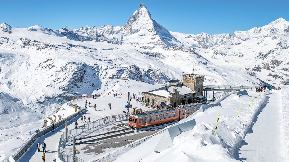 https://cdn-imgix.headout.com/media/images/6b6e1c5538e35f69a82fc5b46fb09b30-3076-zermatt-01-zermatt_-gornergrat-train-01.jpg