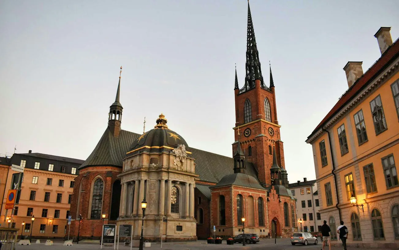 Riddarholmen Church in Stockholm at dusk, part of the Ghosts of Stockholm tour.