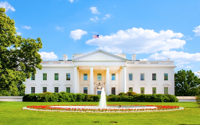 White House exterior with fountain and gardens, Washington DC.