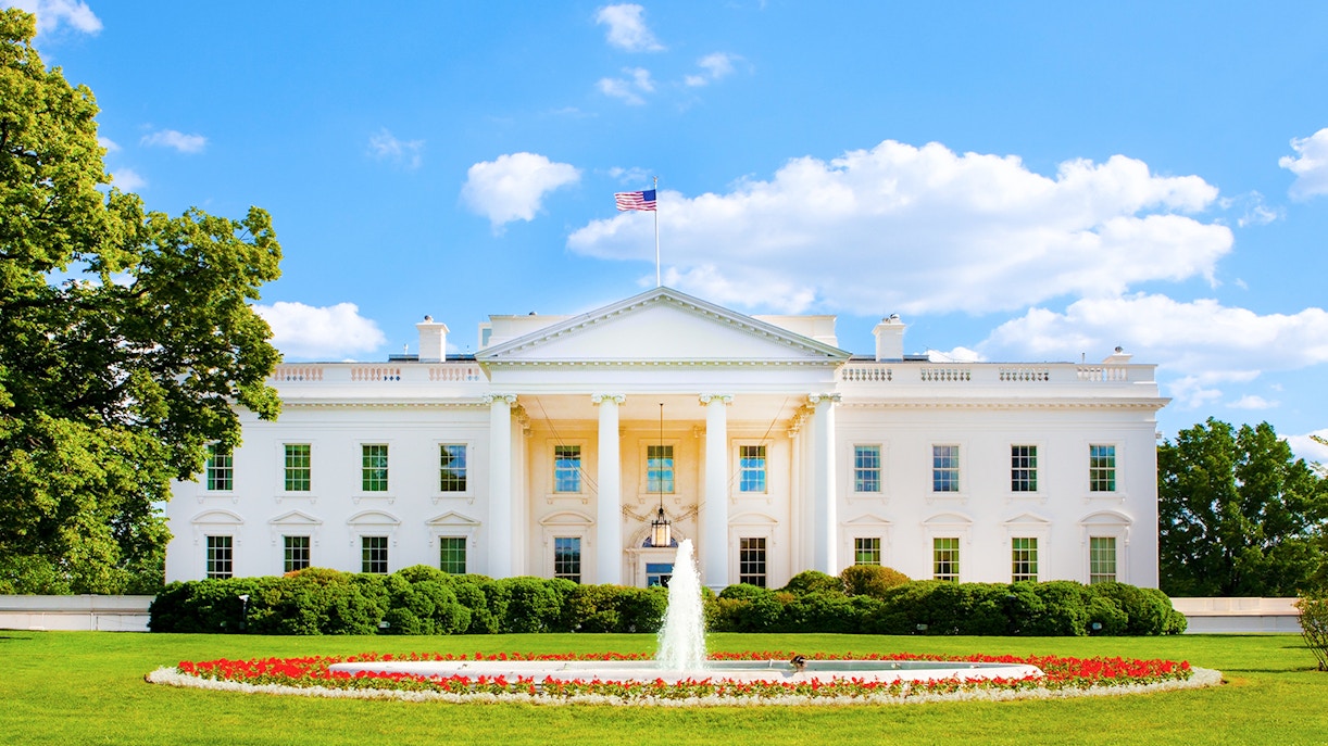 White House exterior with fountain and gardens, Washington DC.