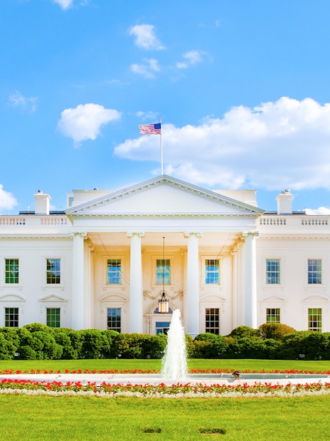 White House exterior with fountain and gardens, Washington DC.