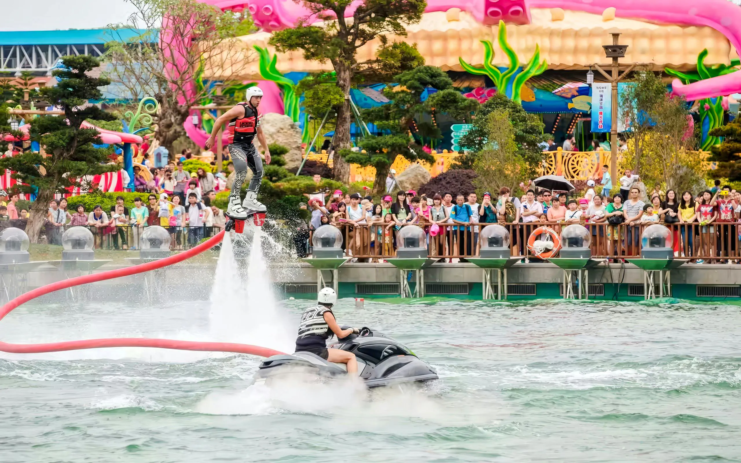 Flyboard performer doing water stunt at Zhuhai Chimelong Ocean Kingdom, Guangdong, China.