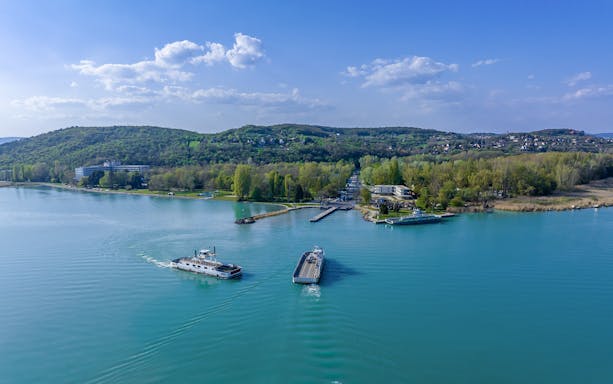 Cruise ship on Lake Balaton with Tihany Peninsula in the background, Hungary.